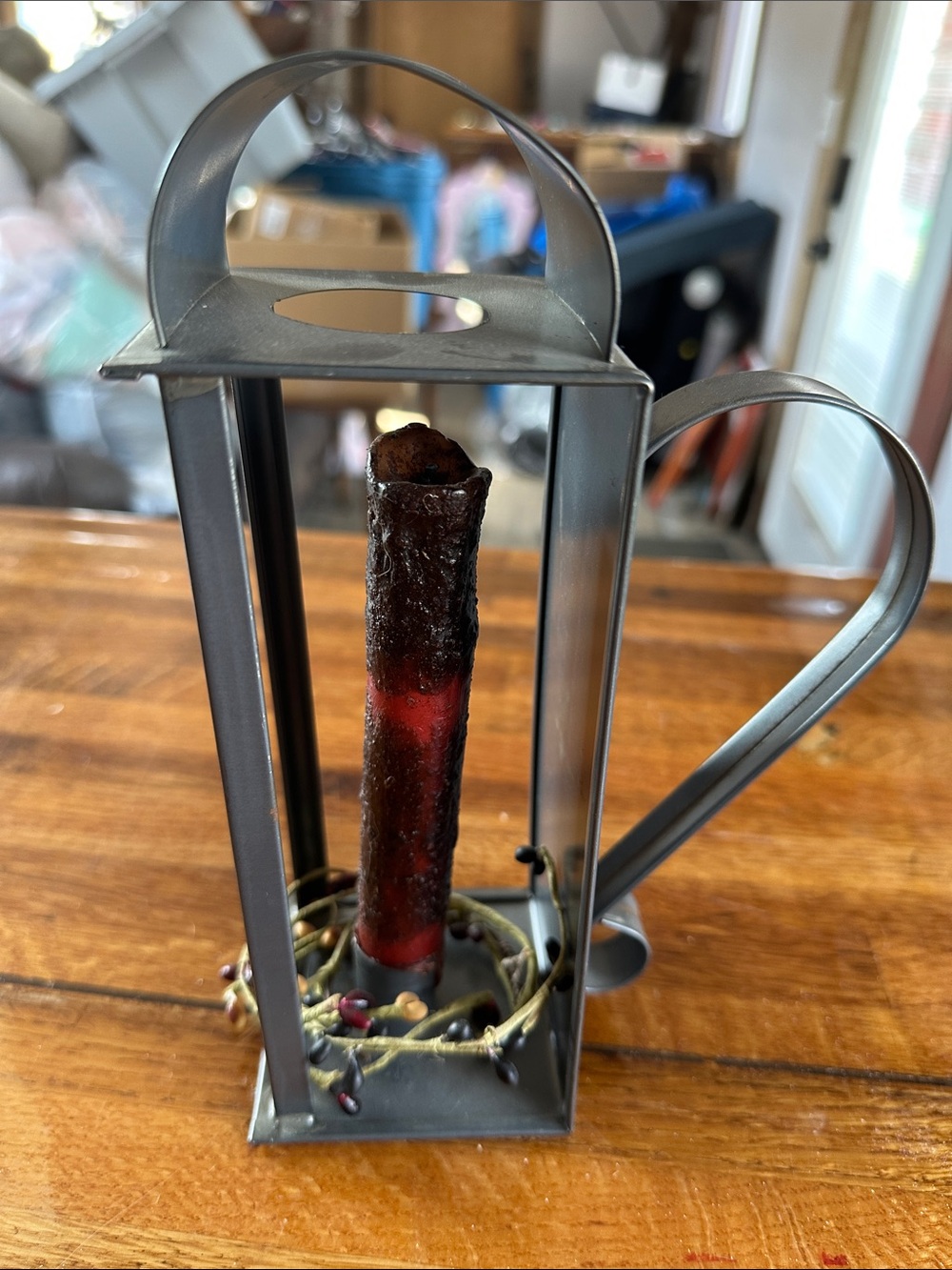 Rustic Metal Lantern with Red Candle